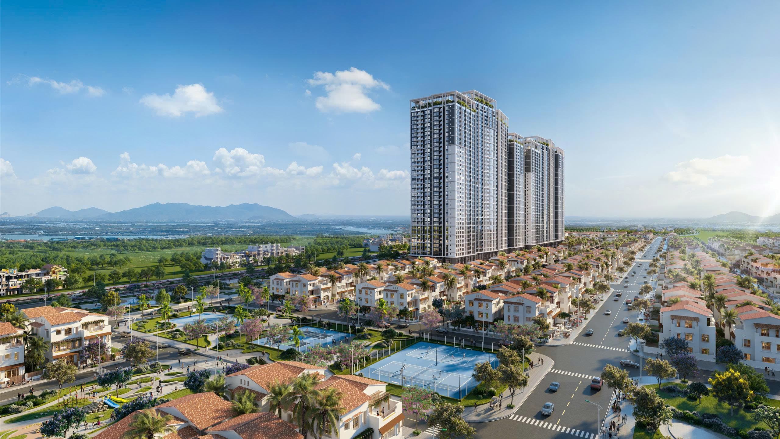 Tháp căn hộ Blanca City nhìn từ trên cao giữa dãy biệt thự và sân tennis