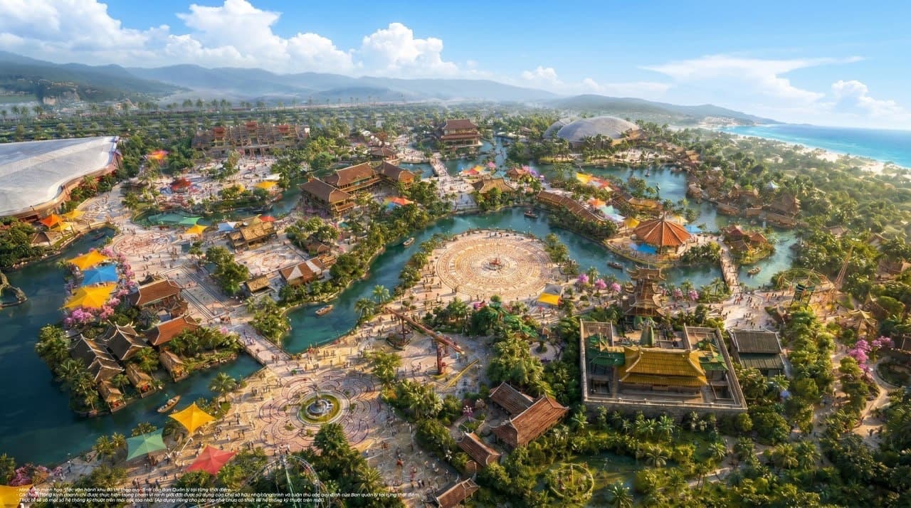 Phối cảnh toàn cảnh công viên chủ đề VinWonders nhìn từ trên cao, các cụm kiến trúc mái cong quanh hồ nước trung tâm, bãi biển phía xa bên phải